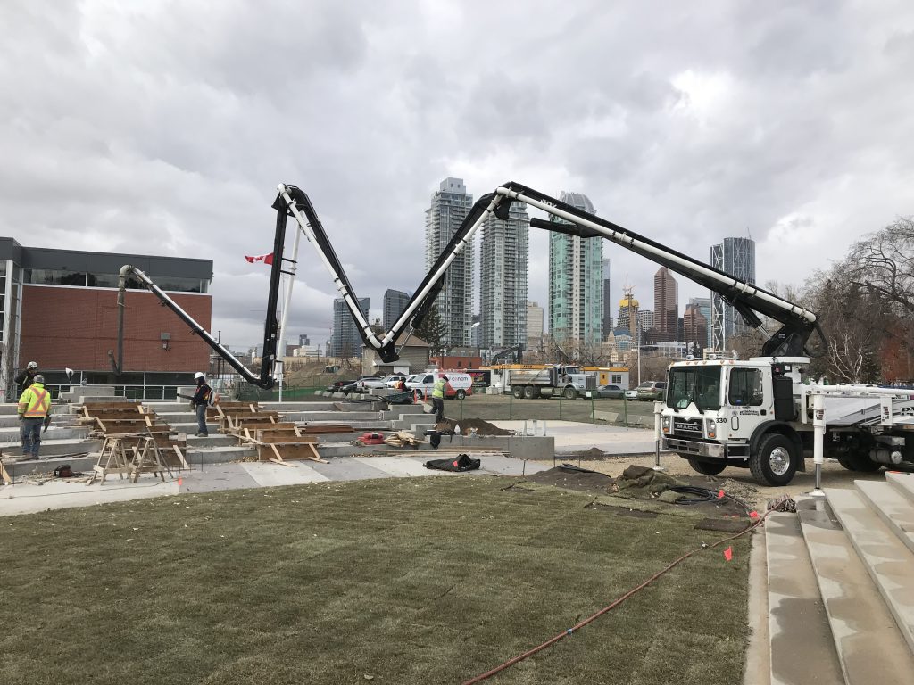 Dynamic Concrete Pumping using vertical and reach concrete pumping equipment on a job
